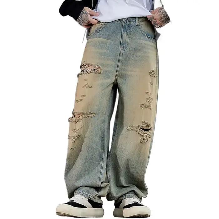 Jean déchiré tendance pour homme, style urbain vintage, en denim pur coton délavé, coupe droite ampl