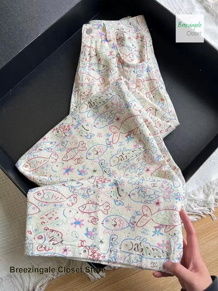 Jean à fleurs entièrement imprimé graffiti américain ins pour femmes, nouveau design à la mode, tail