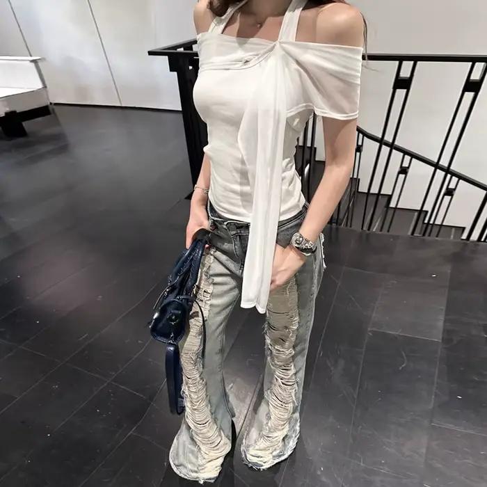 Benuynffy taille basse rétro déchiré jean évasé femme Streetwear mode coréenne mince lavé cloche bas Denim pantalon 2025 nouveau