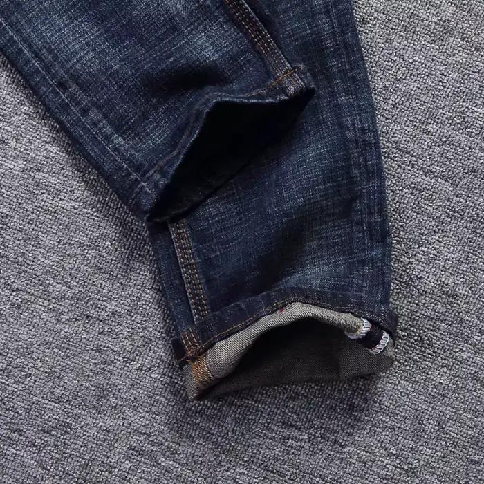Style italien mode hommes jean rétro bleu foncé élastique coupe ajustée déchiré