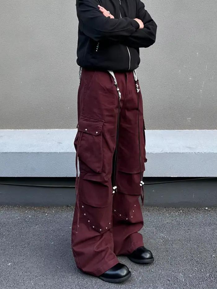 Pantalon cargo baggy plissé noir avec rivets