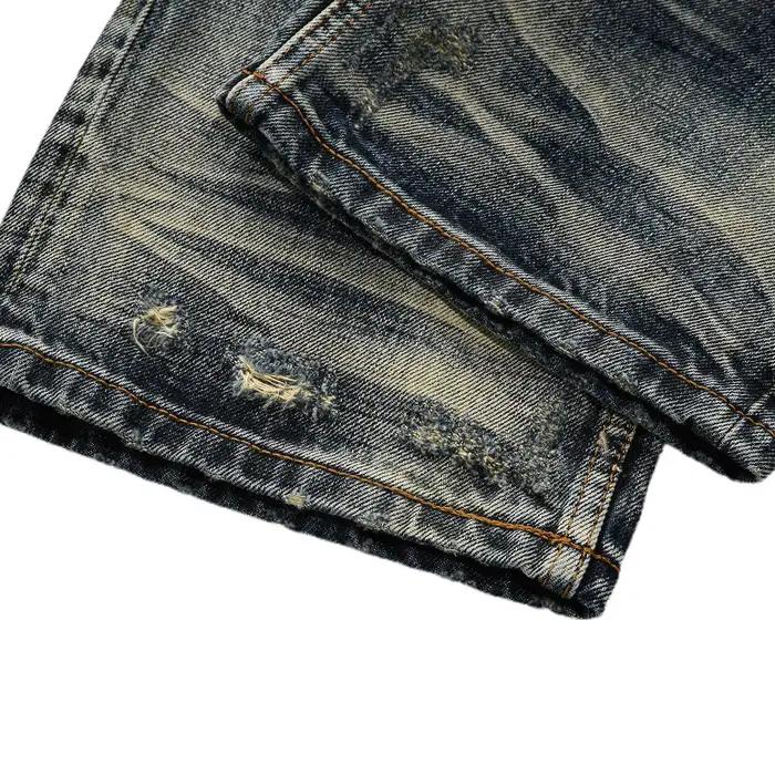Jean droit déchiré vintage américain coupe ample jaune boue contrastant style urbain audacieux pour homme