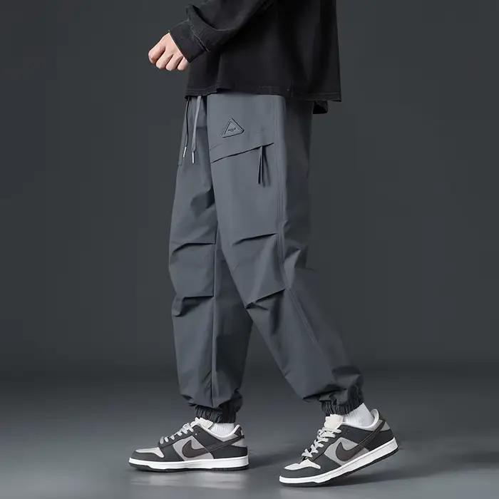 Pantalon de liaison de jambe de marque américaine rétro à la mode pour hommes décontracté fonctionnel parachutistes