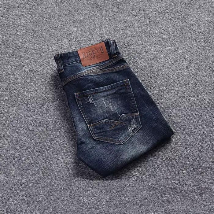Style italien mode hommes jean rétro bleu foncé élastique coupe ajustée déchiré