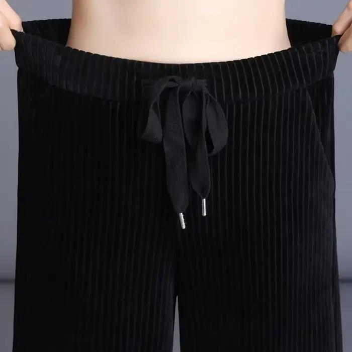 Pantalon large en velours côtelé fluide pour femme