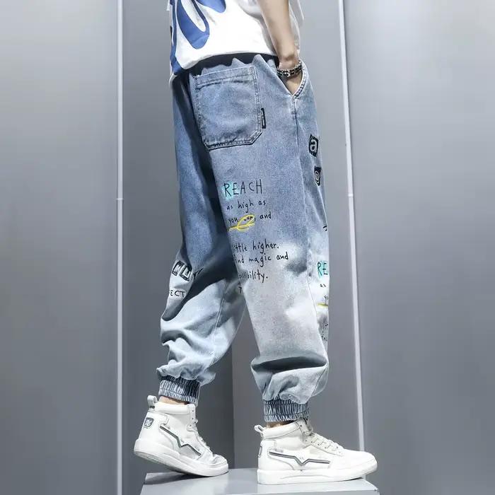 Jeans à imprimé graffiti pour hommes