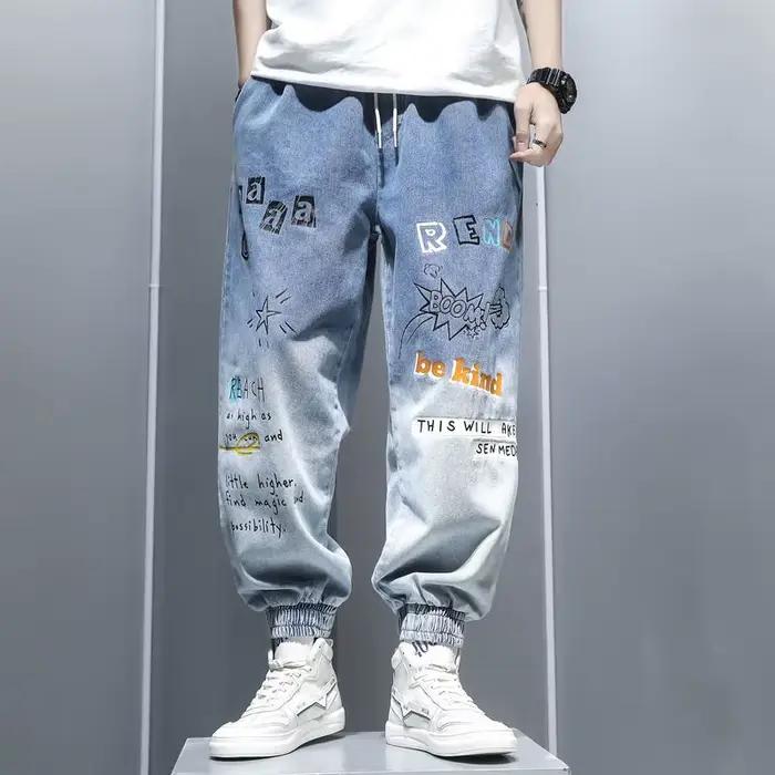 Jeans à imprimé graffiti pour hommes