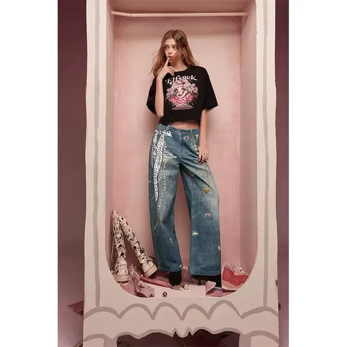 ELFSACK Jeans vintage à jambes larges avec chaîne en forme de cœur et imprimé nœud