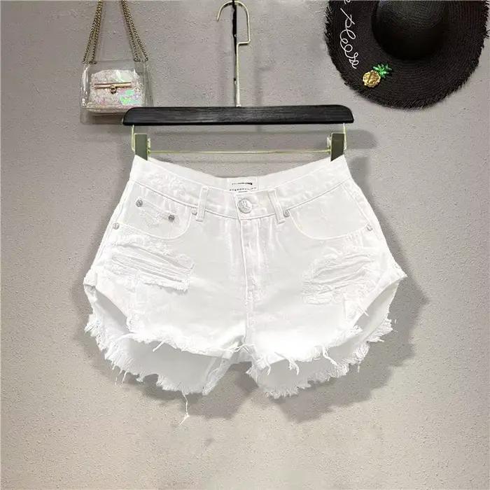 Nouveaux shorts en jean déchirés à bords bruts