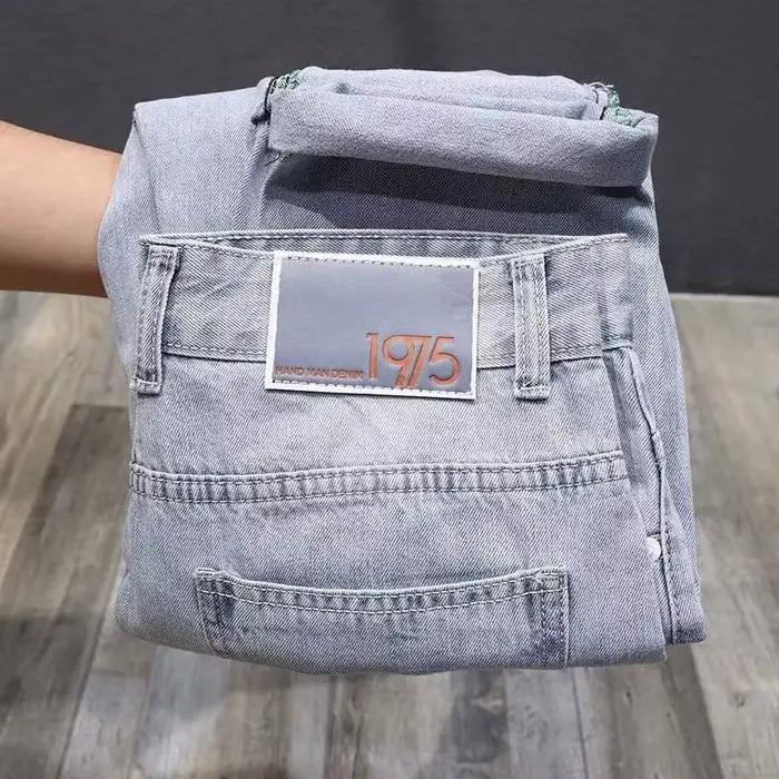 Jean déchiré tendance pour homme coupe droite ample style américain décontracté pour l'été occasions urbaines et spéciales