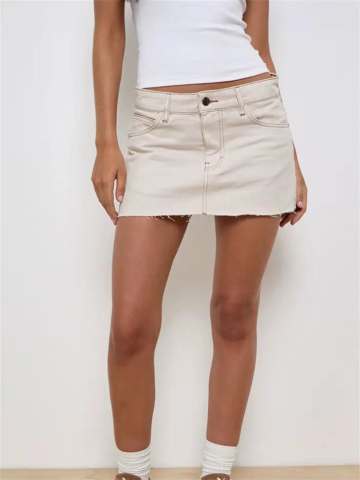 Nouvelles femmes Denim Mini jupes taille basse ourlet brut décontracté mode Jean