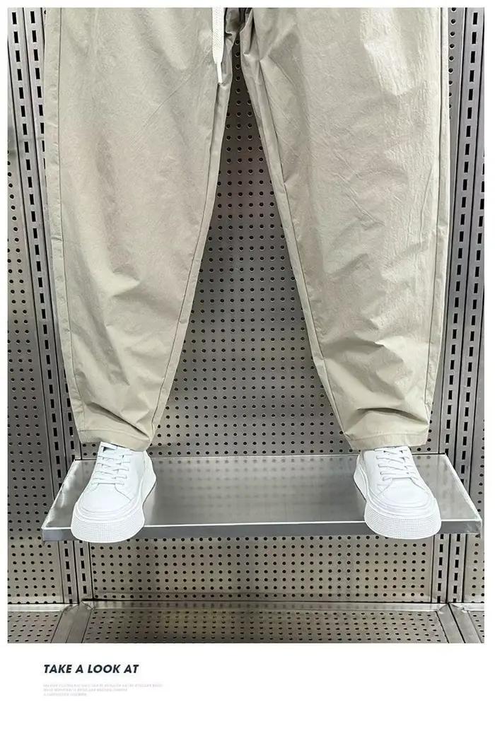 2025 printemps et automne nouveau pantalon décontracté de couleur unie ample droit polyvalent