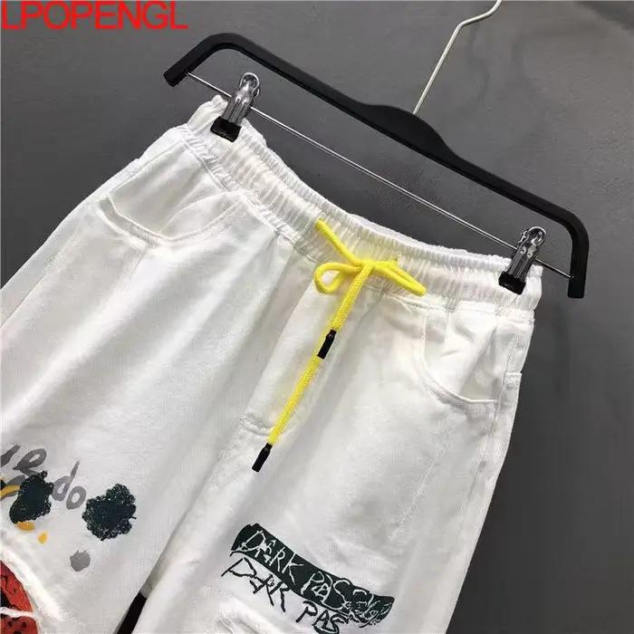 Nouveau Jean Rétro Déchiré Personnalisé Femme Pantalon Harem Ample Longueur Cheville Cordon Patchwork Occasions Spéciales