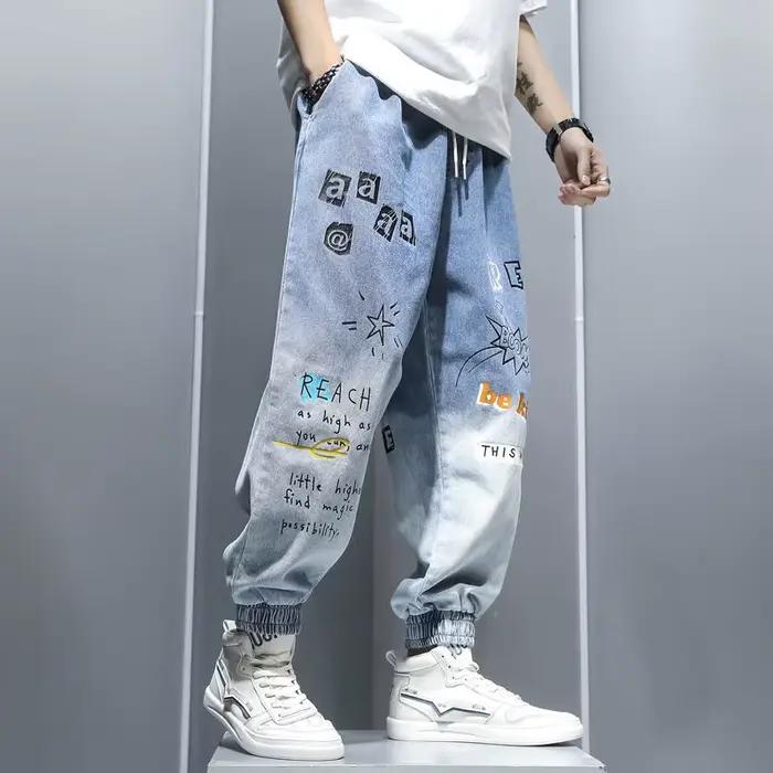 Jeans à imprimé graffiti pour hommes