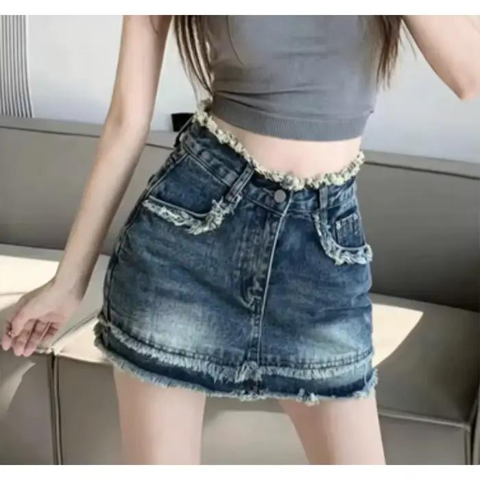 Jupe courte en jean vintage taille haute à ourlet effiloché pour femme