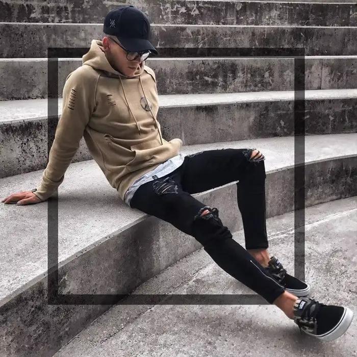 Jeans pour hommes nouveau pantalon tendance noir déchiré avec fermeture éclair extensible