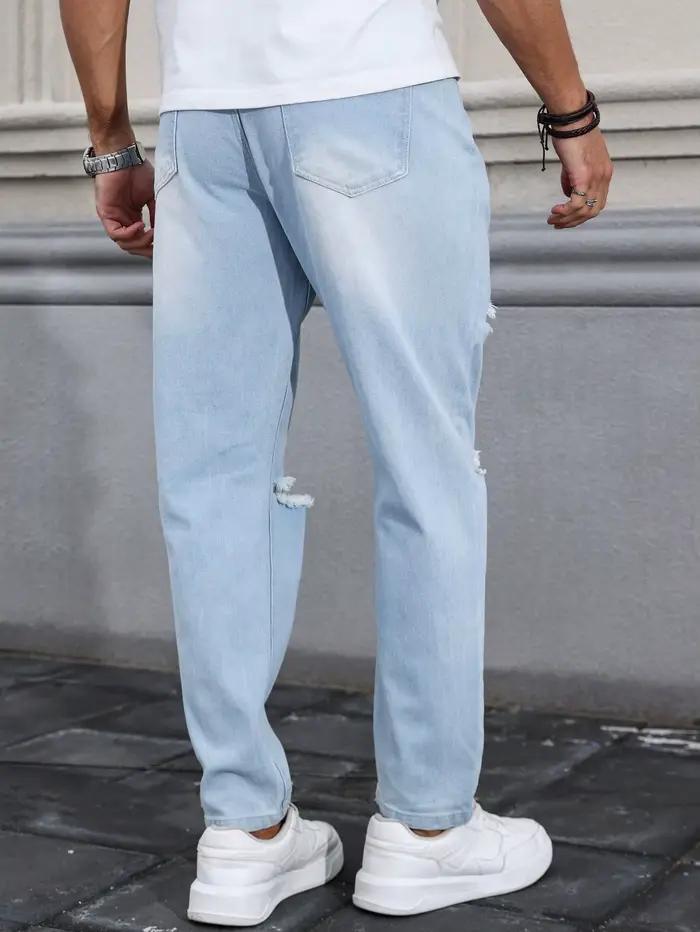 Jean déchiré bleu clair pour homme pour le printemps et l'automne. Pantalon