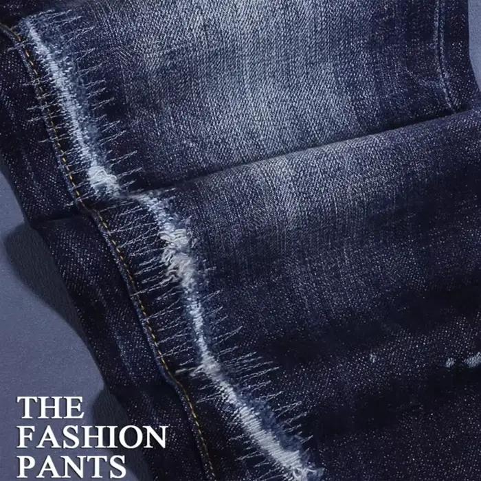 Jean homme bleu foncé avec déchirures et délavage effet vieilli pour hommes de tous âges, style high street, quatre saisons, ajustement mince, fermeture à boutonnière, toile épluchage, coton et spandex