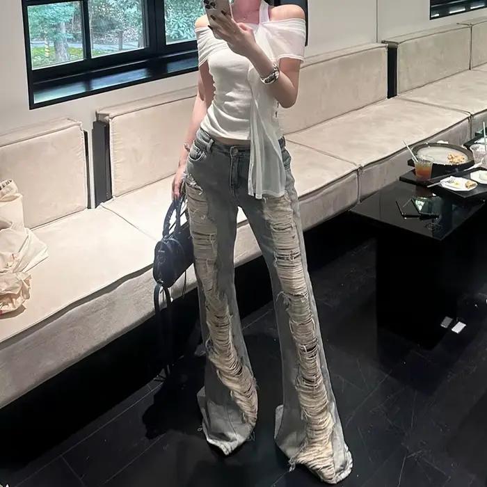 Benuynffy taille basse rétro déchiré jean évasé femme Streetwear mode coréenne mince lavé cloche bas Denim pantalon 2025 nouveau