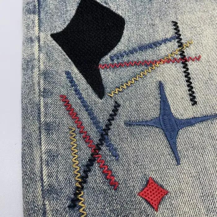 Jean brodé patché vieux lambeaux pour hommes