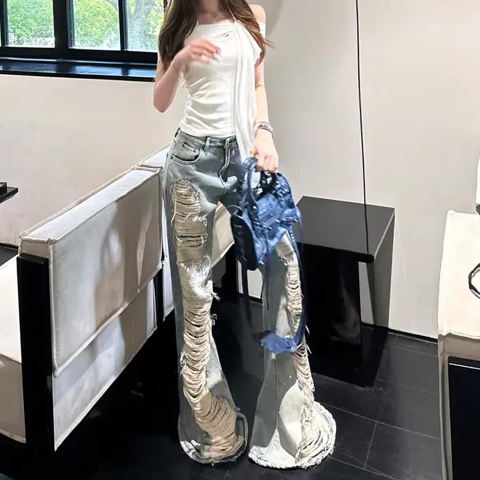 Benuynffy taille basse rétro déchiré jean évasé femme Streetwear mode coréenne mince lavé cloche bas Denim pantalon 2025 nouveau