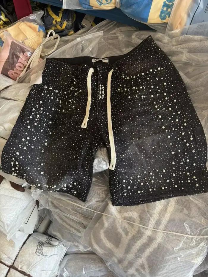 Shorts en jean camouflage perlé