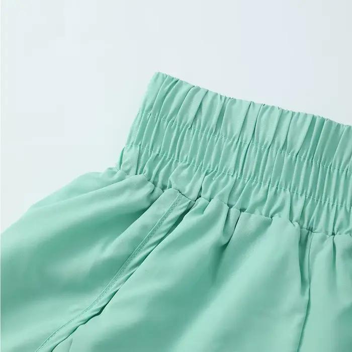 Shorts de course pour femmes, shorts de sport taille haute, shorts de gym élastiques, shorts de fitness, shorts d'entraînement à séchage rapide, vêtements pour femmes polyvalents et durables pour des sessions d'entraînement intenses