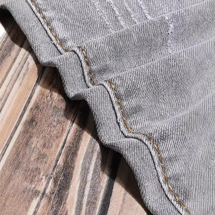 Créateur de mode hommes jean rétro gris Stretch mince déchiré