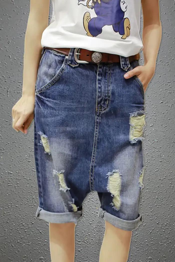 Shorts en jean femme style harem baggy coupe basse déchirés tendance hip hop punk effet tombant style cowboy été 2026