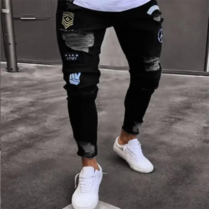 Jeans en denim slim décontractés avec détails déchirés et badge 4X pour homme occassions décontractées et événements informels
