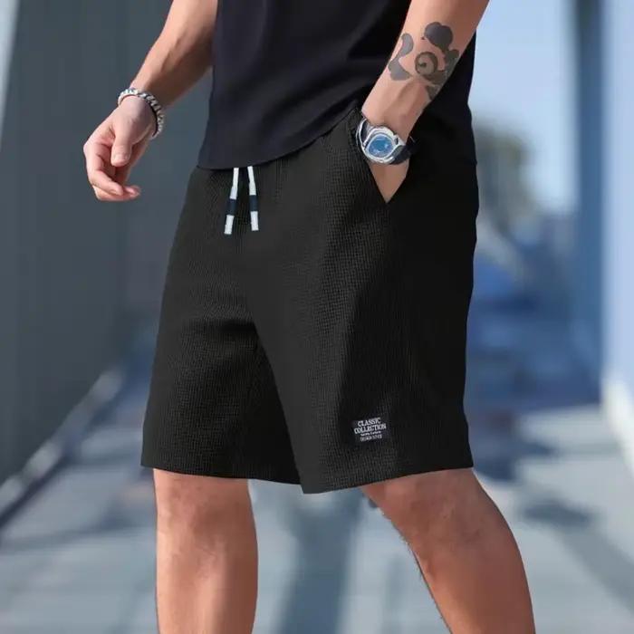 Shorts pour hommes en tissu texturé, respirants et décontractés, idéaux pour plage, sport et sorties estivales