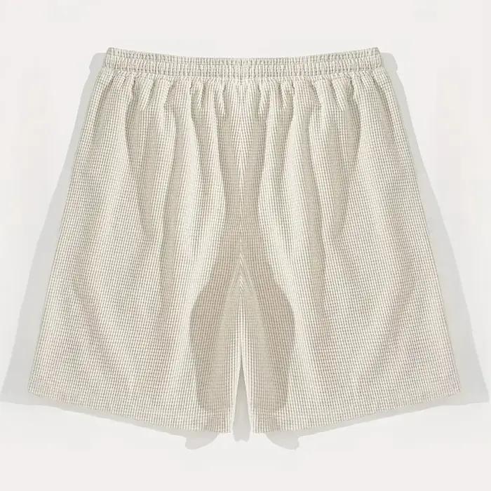 Shorts pour hommes en tissu texturé, respirants et décontractés, idéaux pour plage, sport et sorties estivales