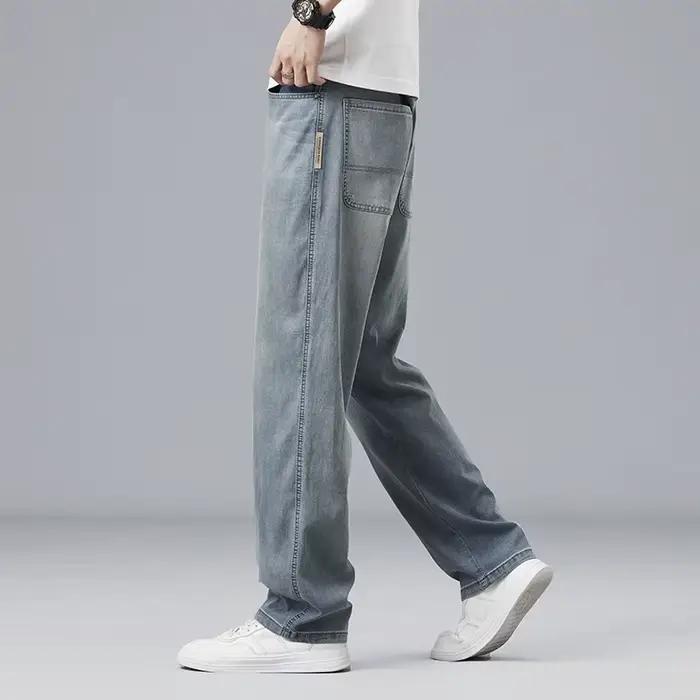 Été Ultra-mince Lyocell hommes jean drapé tissu doux ample droit décontracté Denim pantalon élastique glace soie mâle