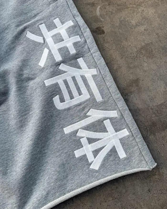 Shorts de survêtement amples effet usé pour homme, broderie Kanji japonais, patch drapeau du Japon, cordon de serrage, style Y2K Harajuku, longueur genou, Jorts streetwear