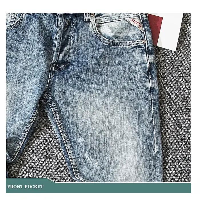Style italien mode hommes jean rétro bleu clair coupe ajustée déchiré