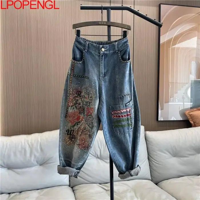 Jean en denim brodé taille élastique orné de strass pour femme