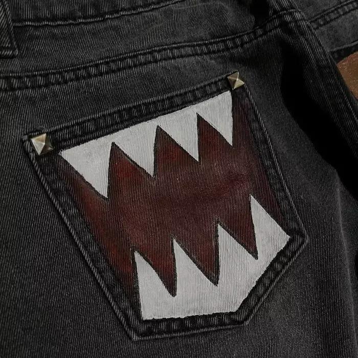 Jean tendance à imprimé dent de monstre