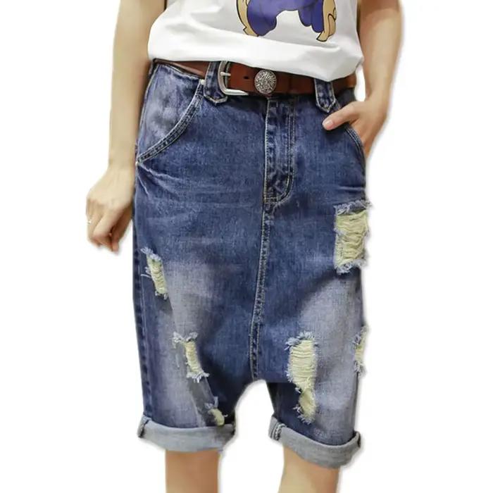 Shorts en jean femme style harem baggy coupe basse déchirés tendance hip hop punk effet tombant style cowboy été 2026