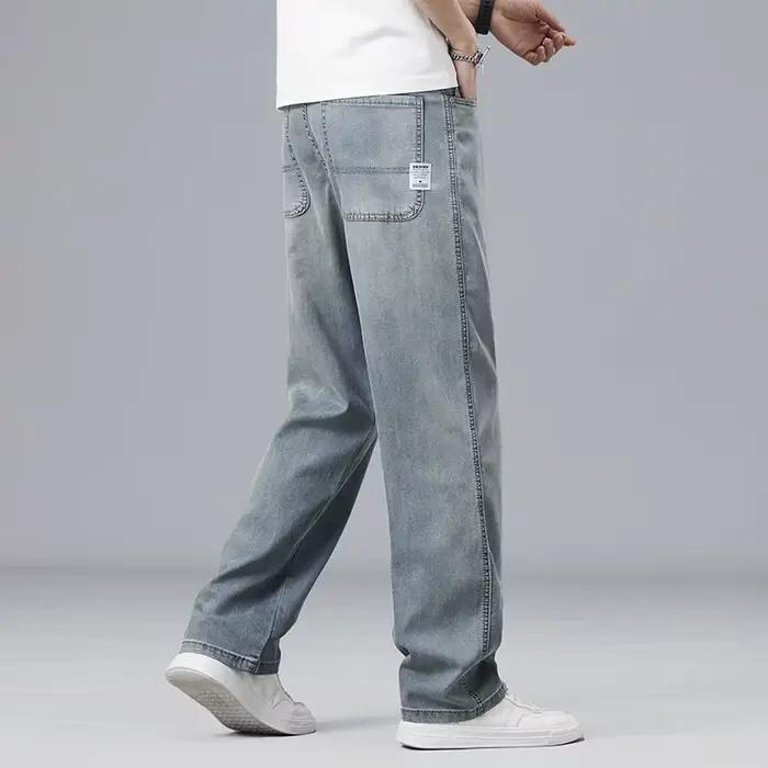 Été Ultra-mince Lyocell hommes jean drapé tissu doux ample droit décontracté Denim pantalon élastique glace soie mâle
