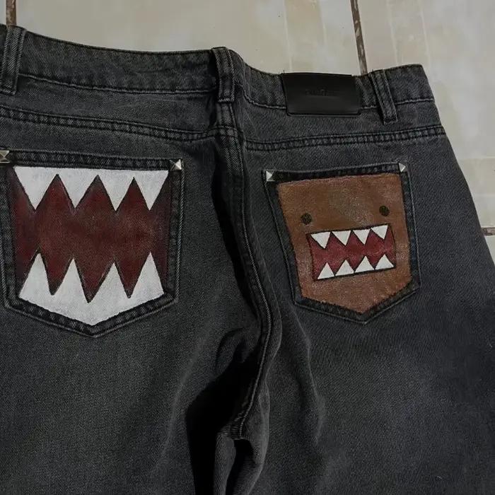 Jean baggy noir délavé pour homme avec broderie dent de monstre