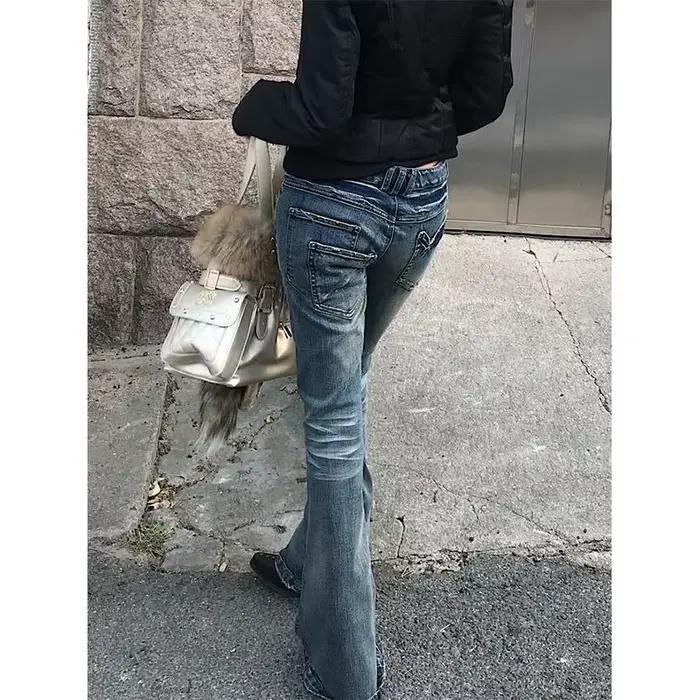 Jean évasé déchiré taille basse bleu vintage pour femme style rétro américain coupe slim printemps été