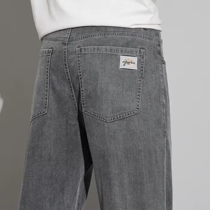 2025 Lyocell été mince jean hommes taille haute ample confortable droit élastique Denim pantalon affaires homme