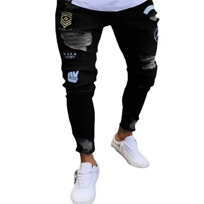 Jeans en denim slim décontractés avec détails déchirés et badge 4X pour homme occassions décontractées et événements informels