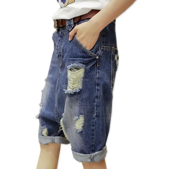 Shorts en jean femme style harem baggy coupe basse déchirés tendance hip hop punk effet tombant style cowboy été 2026