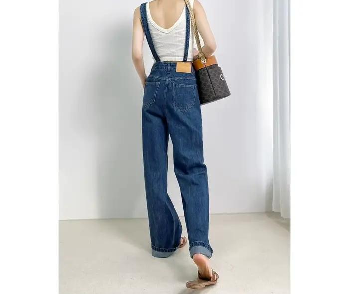 Salopette asymétrique en jean coupe slim 2026