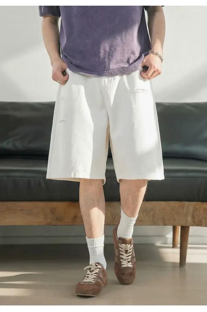 Shorts en jean déchirés à coupe couteau pour homme – Collection été 2026