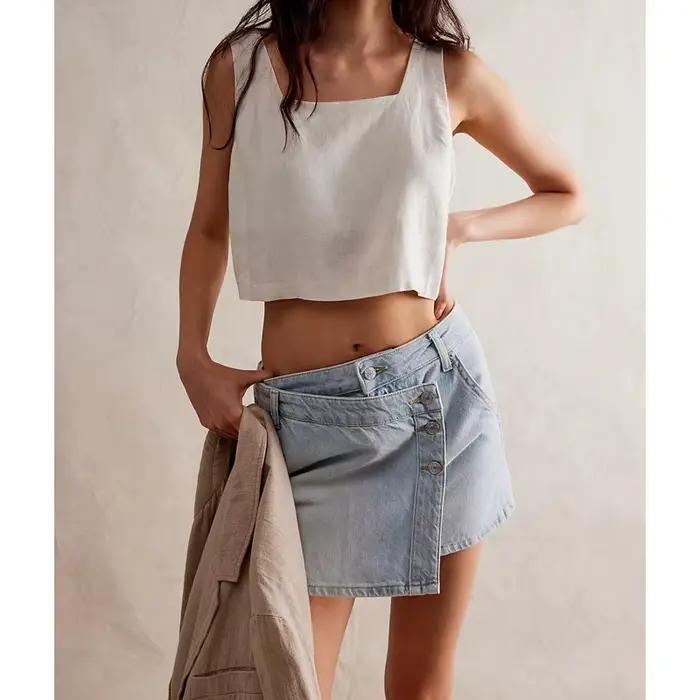 Combhasaki Jupe-short en jean asymétrique pour femme, style Y2K, boutonnée sur le devant, en denim extensible, taille haute, coupe enveloppante