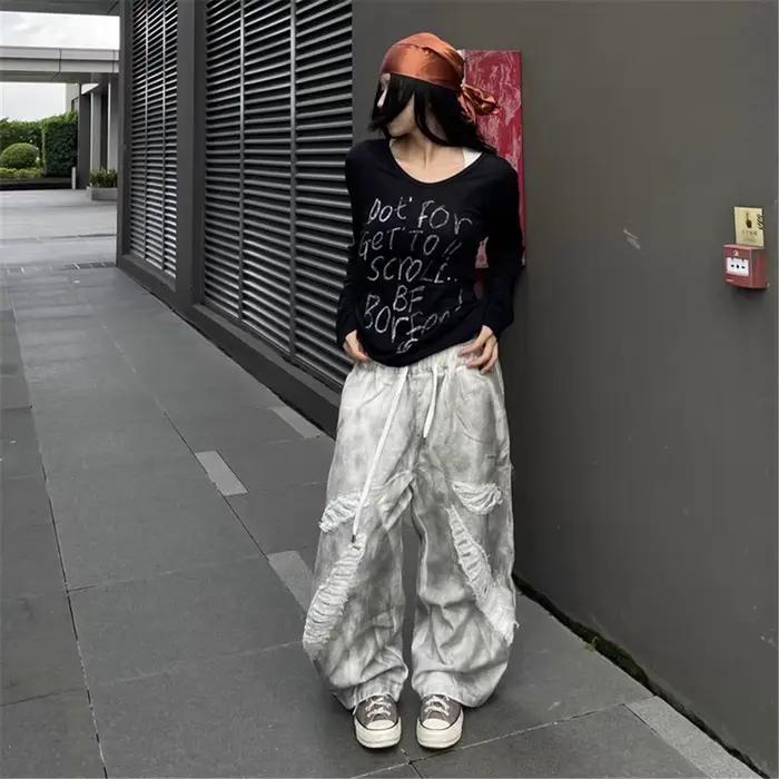 Jeans délavés vintage ample pour hommes et femmes avec trous décoratifs style hip-hop printemps automne danse occasionnels