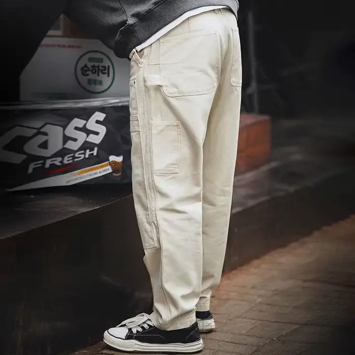 Maden vêtements de travail américain rétro en détresse ample blanc cassé jean lavé droit Multi poche coupe de bois pantalon hommes