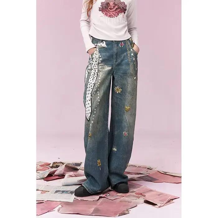 ELFSACK Jeans vintage à jambes larges avec chaîne en forme de cœur et imprimé nœud
